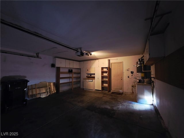 4704 Wild Oak Way N, Las Vegas, NV 89031 - garage featuring a garage door opener and secured water heater