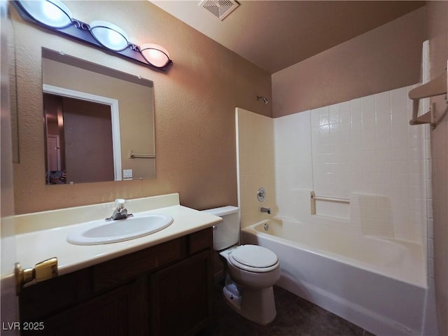 4704 Wild Oak Way N, Las Vegas, NV 89031 - full bathroom with vanity,  shower combination, a textured wall, and tile patterned flooring