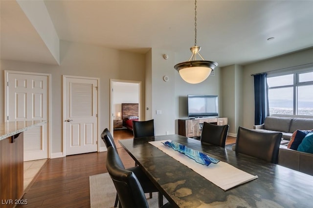 150 Las Vegas Blvd Unit 2115, Las Vegas, NV 89101 - dining area featuring dark wood finished floors and baseboards