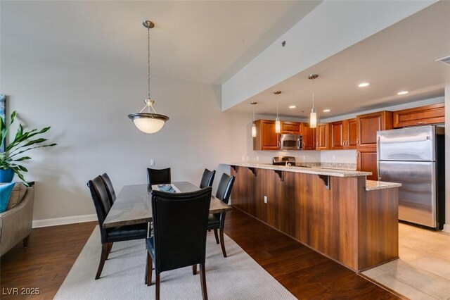150 Las Vegas Blvd Unit 2115, Las Vegas, NV 89101 - dining area with light wood-style floors, recessed lighting, and baseboards