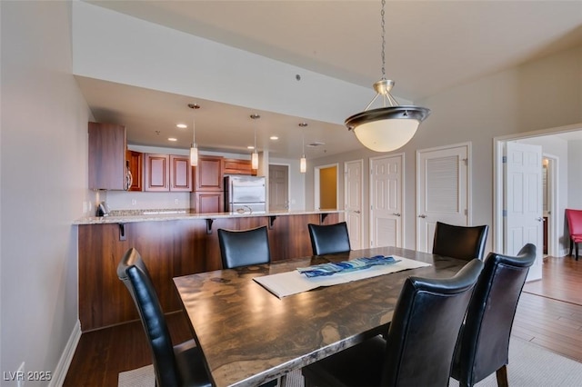 150 Las Vegas Blvd Unit 2115, Las Vegas, NV 89101 - dining area featuring dark wood-style floors, baseboards, and recessed lighting