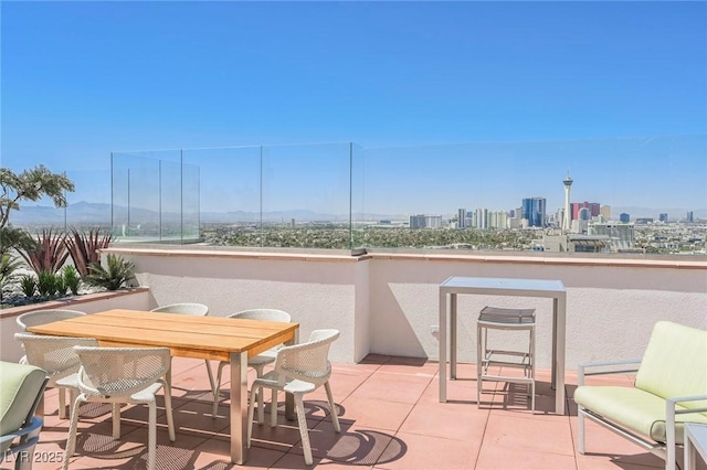 150 Las Vegas Blvd Unit 2115, Las Vegas, NV 89101 - view of patio / terrace with a view of skyline and outdoor dining area