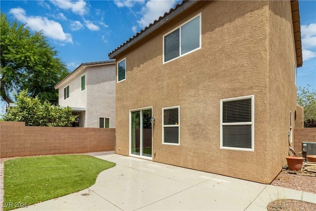 7345 Chesapeake Cove St, Las Vegas, NV 89166 - back of house with stucco siding, a patio, central air condition unit, and a tile roof
