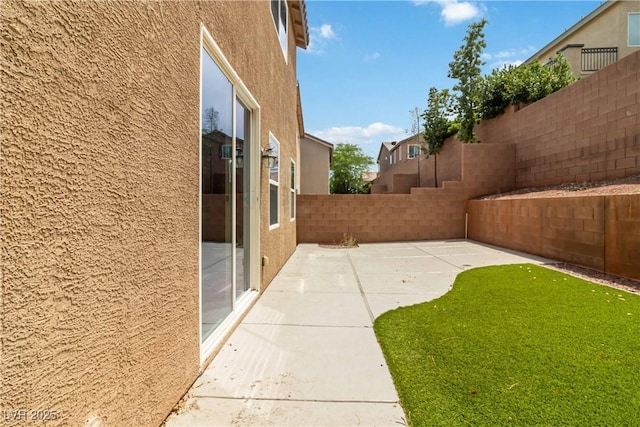 7345 Chesapeake Cove St, Las Vegas, NV 89166 - fenced backyard featuring a patio