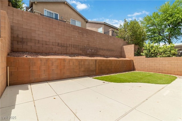 7345 Chesapeake Cove St, Las Vegas, NV 89166 - fenced backyard with a patio area