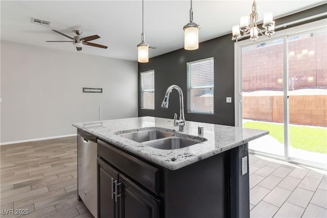 7345 Chesapeake Cove St, Las Vegas, NV 89166 - kitchen with a sink, plenty of natural light, dishwasher, and a chandelier