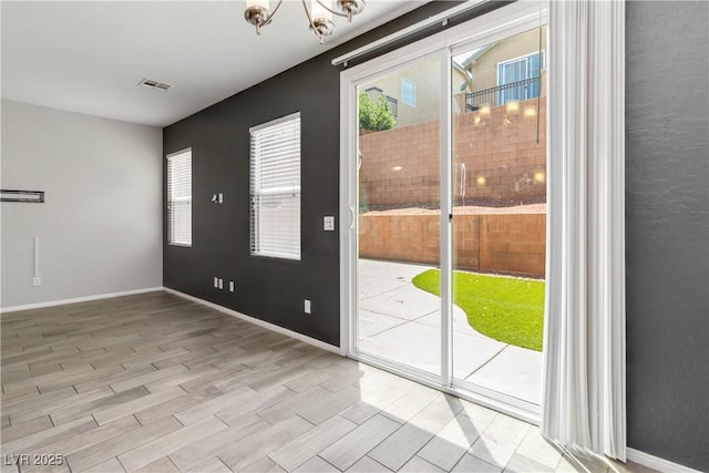 7345 Chesapeake Cove St, Las Vegas, NV 89166 - entryway with wood finished floors and baseboards