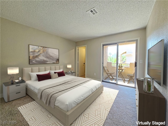 6853 Tamarus St Unit 202, Las Vegas, NV 89119 - carpeted bedroom with access to outside and a textured ceiling