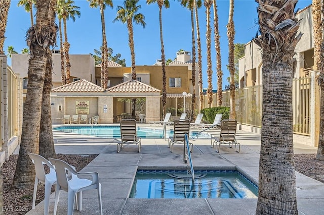 6853 Tamarus St Unit 202, Las Vegas, NV 89119 - community pool with a patio area