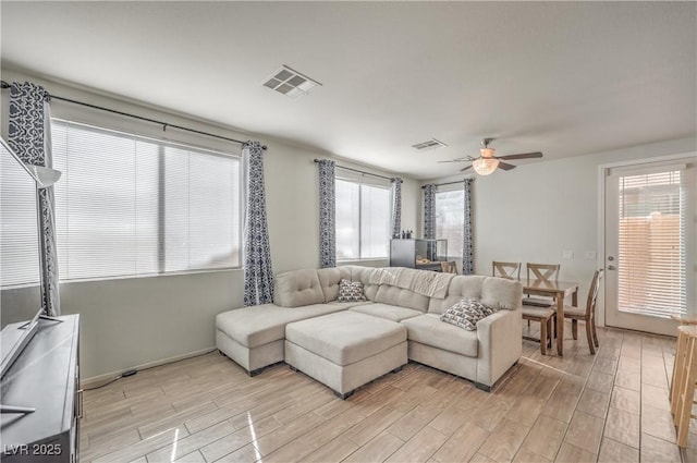 5232 Pendergrass St, North Las Vegas, NV 89081 - living room featuring light wood-style floors and a ceiling fan