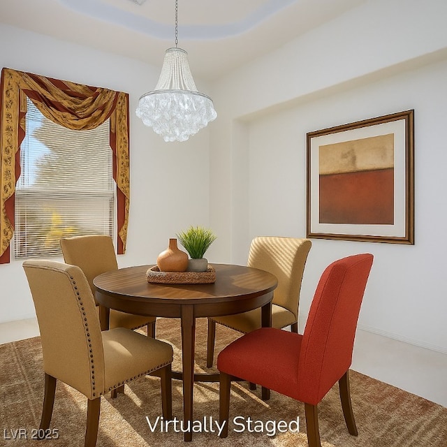 10628 Mission Lakes Ave, Las Vegas, NV 89134 - dining space with a chandelier and carpet flooring