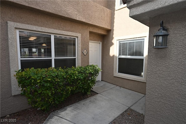 5125 W Reno Ave Unit 1059, Las Vegas, NV 89118 - view of exterior entry with stucco siding