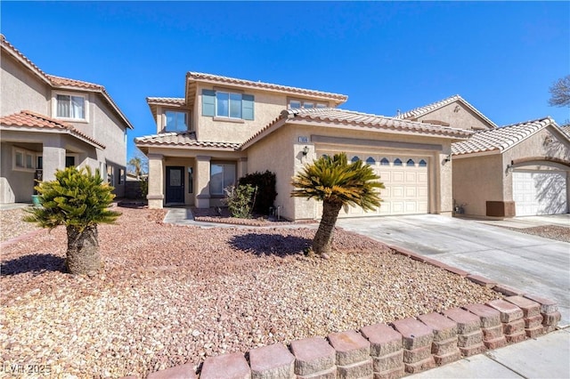 7836 Pinnochio Ave, Las Vegas, NV 89131 - mediterranean / spanish home featuring an attached garage, concrete driveway, stucco siding, and a tile roof
