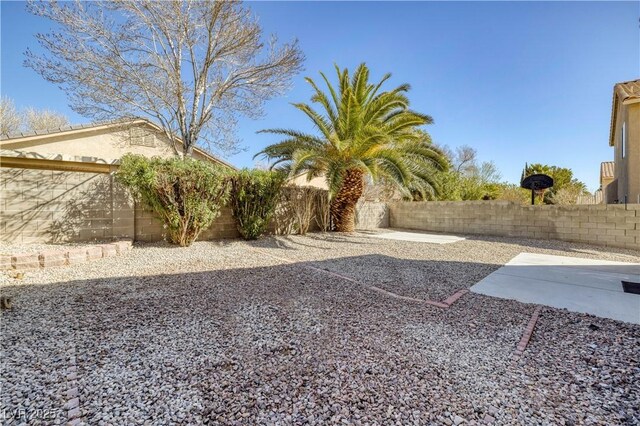 7836 Pinnochio Ave, Las Vegas, NV 89131 - fenced backyard featuring a patio area