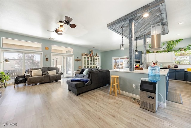 3360 National Ave, Pahrump, NV 89048 - living room featuring light wood finished floors and a ceiling fan