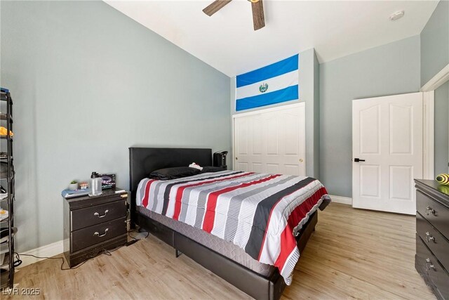 3360 National Ave, Pahrump, NV 89048 - bedroom with wood finished floors, lofted ceiling, baseboards, and a ceiling fan