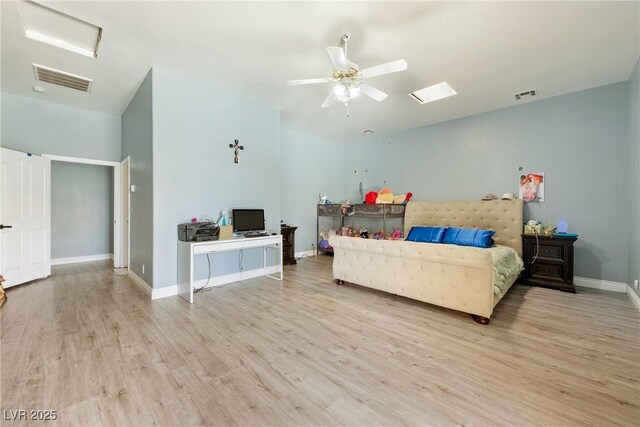 3360 National Ave, Pahrump, NV 89048 - bedroom with wood finished floors, baseboards, and a ceiling fan