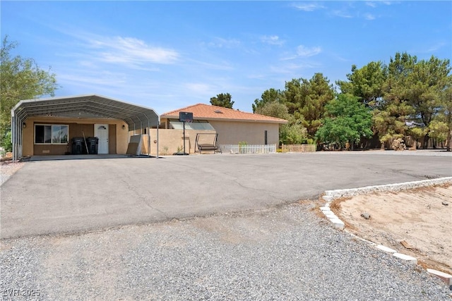 3360 National Ave, Pahrump, NV 89048 - view of front of house featuring a carport and stucco siding