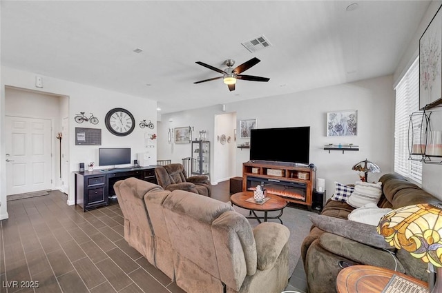 1120 Via Della Curia, Henderson, NV 89011 - living room with ceiling fan and baseboards