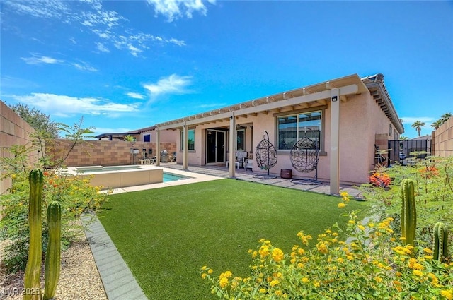 1120 Via Della Curia, Henderson, NV 89011 - rear view of property with stucco siding, a patio area, and a jacuzzi