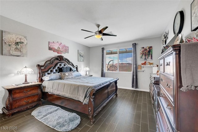 1120 Via Della Curia, Henderson, NV 89011 - bedroom with dark wood-style flooring, baseboards, and a ceiling fan