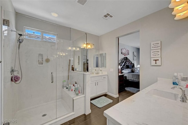 1120 Via Della Curia, Henderson, NV 89011 - ensuite bathroom featuring a shower stall, two vanities, and wood tiled floors