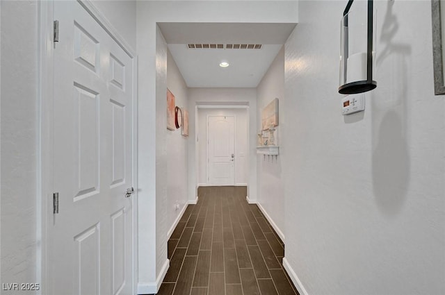 1120 Via Della Curia, Henderson, NV 89011 - hall featuring baseboards, dark wood-type flooring, and recessed lighting
