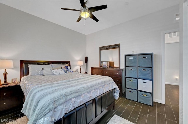 1120 Via Della Curia, Henderson, NV 89011 - bedroom with wood tiled floors, baseboards, and ceiling fan