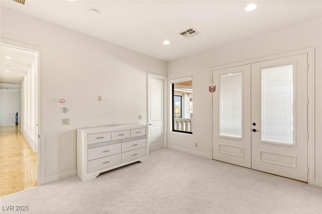 8895 S Tenaya Way, Las Vegas, NV 89113 - unfurnished bedroom with french doors, recessed lighting, light carpet, and baseboards