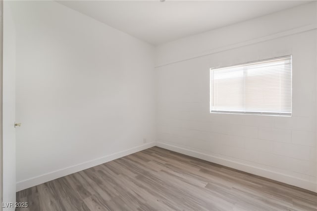 3200 E Owens Ave, North Las Vegas, NV 89030 - unfurnished room featuring wood finished floors and baseboards