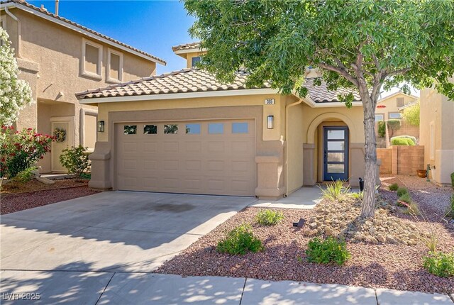 305 Napa Hills Dr, Las Vegas, NV 89144 - mediterranean / spanish home featuring stucco siding, an attached garage, driveway, and a tile roof