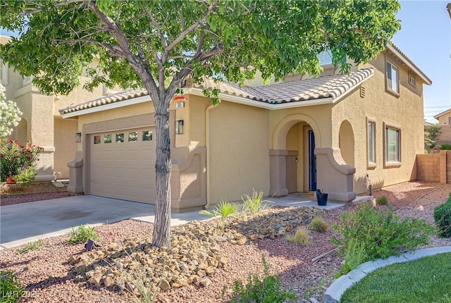 305 Napa Hills Dr, Las Vegas, NV 89144 - mediterranean / spanish home with driveway, stucco siding, an attached garage, and a tiled roof