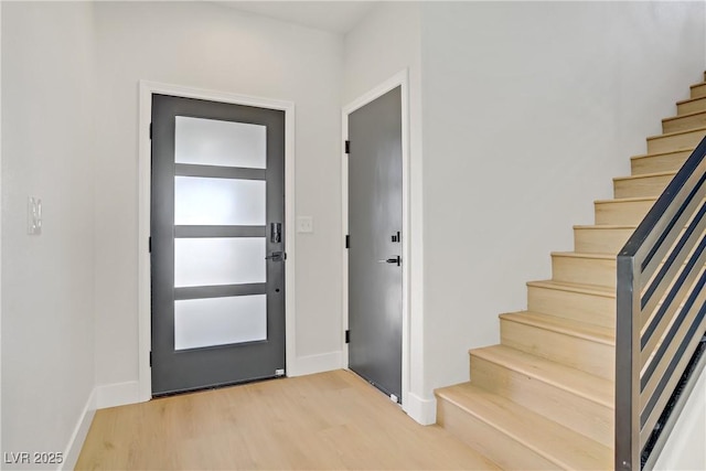 305 Napa Hills Dr, Las Vegas, NV 89144 - entrance foyer featuring stairs and light wood-type flooring