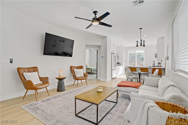 305 Napa Hills Dr, Las Vegas, NV 89144 - living room featuring ceiling fan, light wood finished floors, and recessed lighting