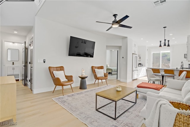 305 Napa Hills Dr, Las Vegas, NV 89144 - living area with light wood-style flooring, ceiling fan, and recessed lighting