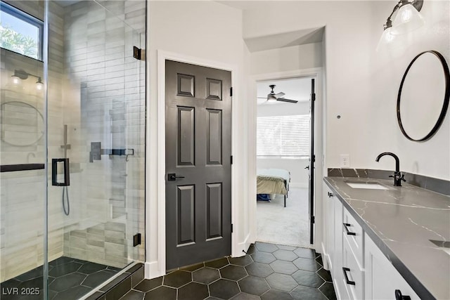 305 Napa Hills Dr, Las Vegas, NV 89144 - full bath featuring vanity, ensuite bathroom, tile patterned flooring, a stall shower, and a ceiling fan