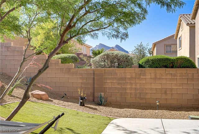 305 Napa Hills Dr, Las Vegas, NV 89144 - fenced yard with a patio area