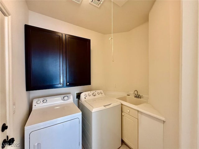 1704 Cordoba Canyon St, Las Vegas, NV 89117 - laundry area with cabinet space and washer and clothes dryer