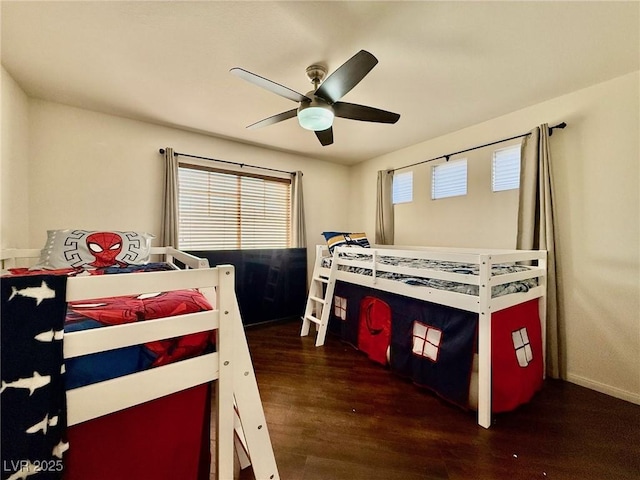 1704 Cordoba Canyon St, Las Vegas, NV 89117 - bedroom featuring wood finished floors, a ceiling fan, and baseboards