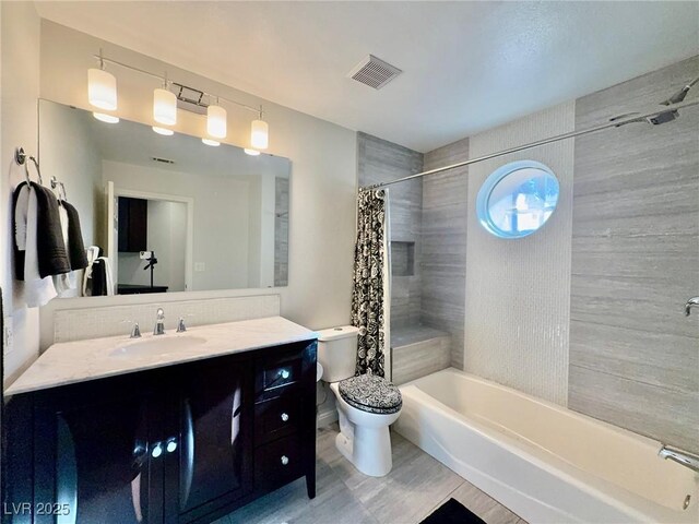 1704 Cordoba Canyon St, Las Vegas, NV 89117 - bathroom featuring shower / bath combo, vanity, and toilet