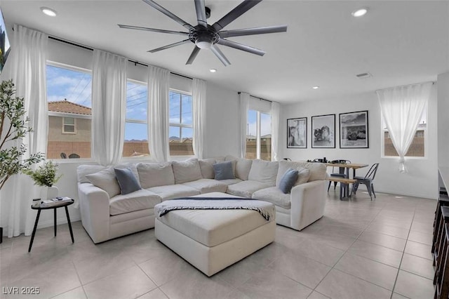 10292 Fragrant Apple Ct, Las Vegas, NV 89141 - living room with light tile patterned floors, a ceiling fan, and recessed lighting