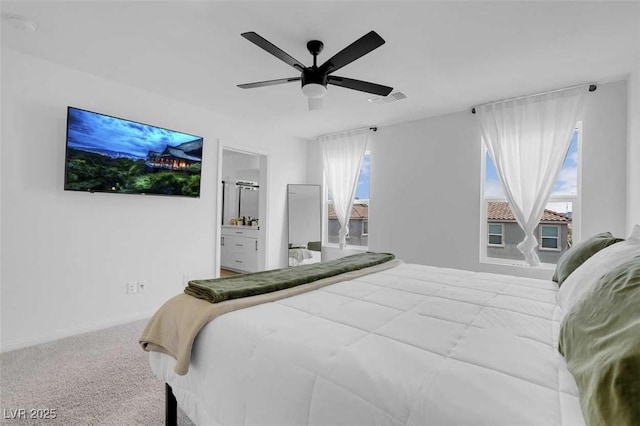 10292 Fragrant Apple Ct, Las Vegas, NV 89141 - bedroom with ceiling fan, carpet flooring, baseboards, and ensuite bathroom