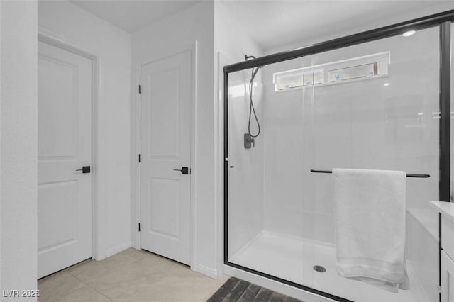 10292 Fragrant Apple Ct, Las Vegas, NV 89141 - bathroom featuring a shower stall and tile patterned flooring