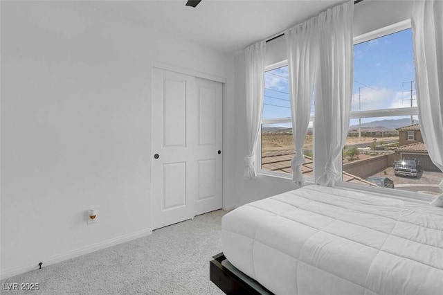 10292 Fragrant Apple Ct, Las Vegas, NV 89141 - carpeted bedroom featuring baseboards and a ceiling fan