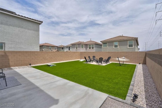 10292 Fragrant Apple Ct, Las Vegas, NV 89141 - view of yard with a patio area, a fire pit, and a residential view