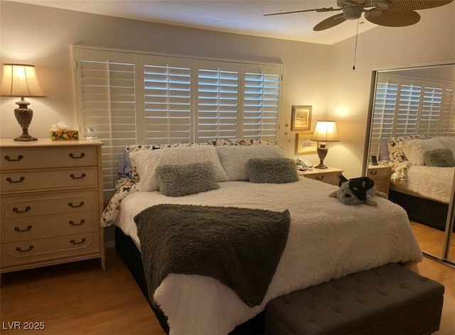 8450 Alta Dr Unit 204, Las Vegas, NV 89145 - bedroom featuring light wood-style flooring, ceiling fan, and lofted ceiling