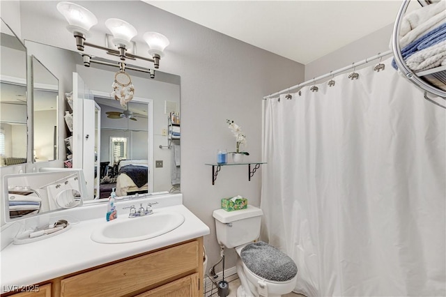 8450 Alta Dr Unit 204, Las Vegas, NV 89145 - full bath with ensuite bathroom, vanity, a ceiling fan, toilet, and a shower with curtain