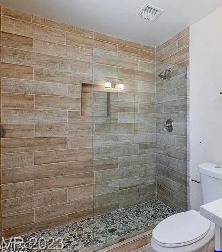 6320 Shawnee Ave, Las Vegas, NV 89107 - full bath featuring toilet and tiled shower