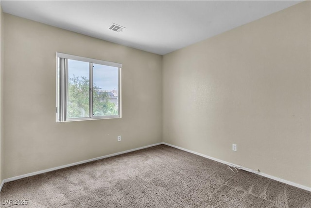 682 E Sole Addiction Ave, Las Vegas, NV 89183 - carpeted spare room with baseboards