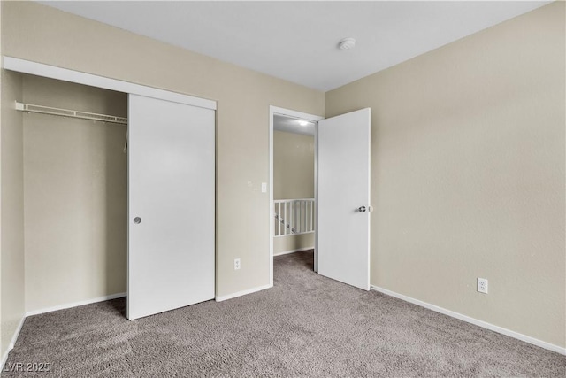 682 E Sole Addiction Ave, Las Vegas, NV 89183 - unfurnished bedroom with carpet, a closet, and baseboards